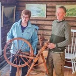 Dee Schaefer pictured with Erling Skjonsbyhagen and the Rokk – a spinning wheel that belonged to Dee’s ancestors. (Submitted photo)