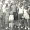 Cousins and two mothers/aunts on Andrew Wolling’s farm in 1962. In front: Rolf the dog, (first row from left) Galen Dallmann, Donna Dallmann, Darlene Dallmann, (second row) David Dallmann, Leland Fluck, Sandra Dallmann, Deanna Fluck, (back row) June Dallmann, Carol Dallmann, Dick Fluck, Orda Fluck, Beverly Dallmann, and Janice Dallmann. Jayson Dallmann and Candas Wolling had not been born yet. (Submitted photo)