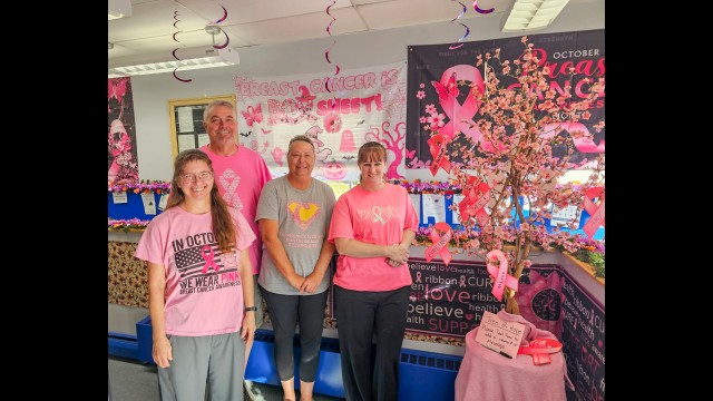 The Gibbon Post Office Staff (pictured from left) Postmaster Annette, Carriers Jay and Layla and Clerk Alicia went all in this month in their efforts to raise awareness and sell stamps during October’s Breast Cancer Awareness campaign and contest.